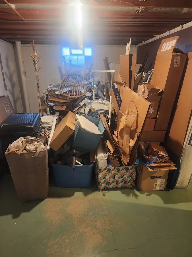 Roll-off dumpster container at job site for 2 Yard Dumpster Rental in Donora